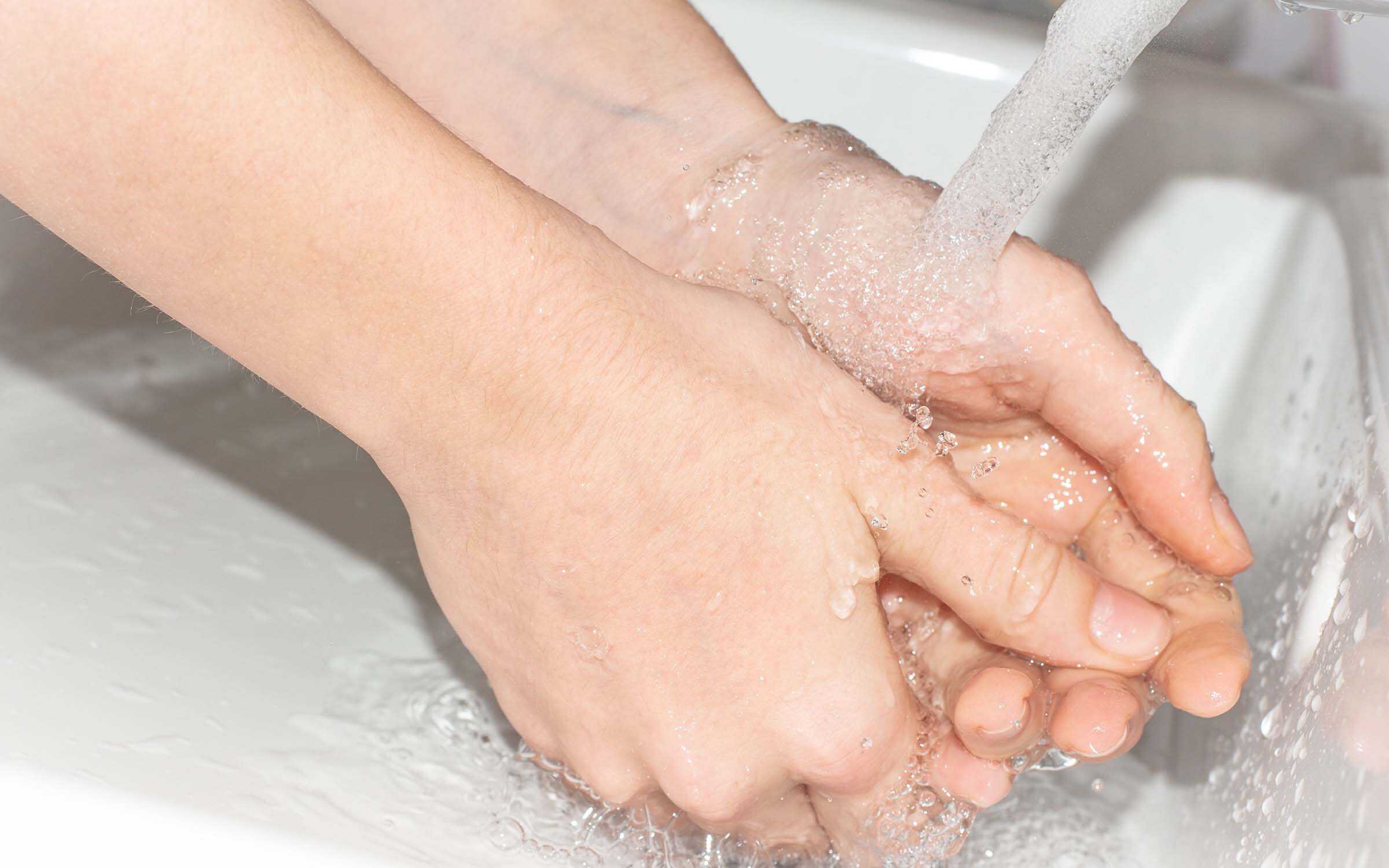 Dry your hands the right way after washing your hands in the sink.